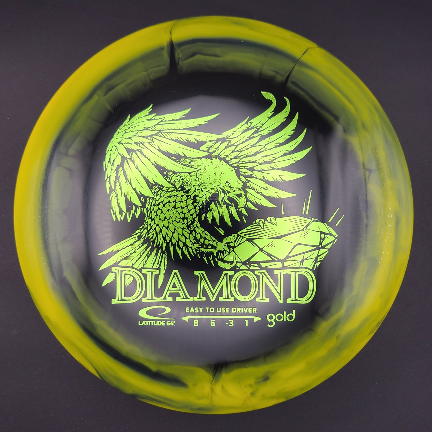 Latitude 64 - Diamond - Gold Orbit (Inverted Stamp)